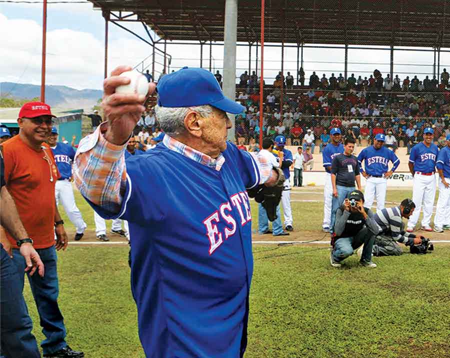 José O. Padrón throwing the first pitch at a baseball game celebrating the Padrón family’s support for the people and the community of Estelí, Nicaragua.